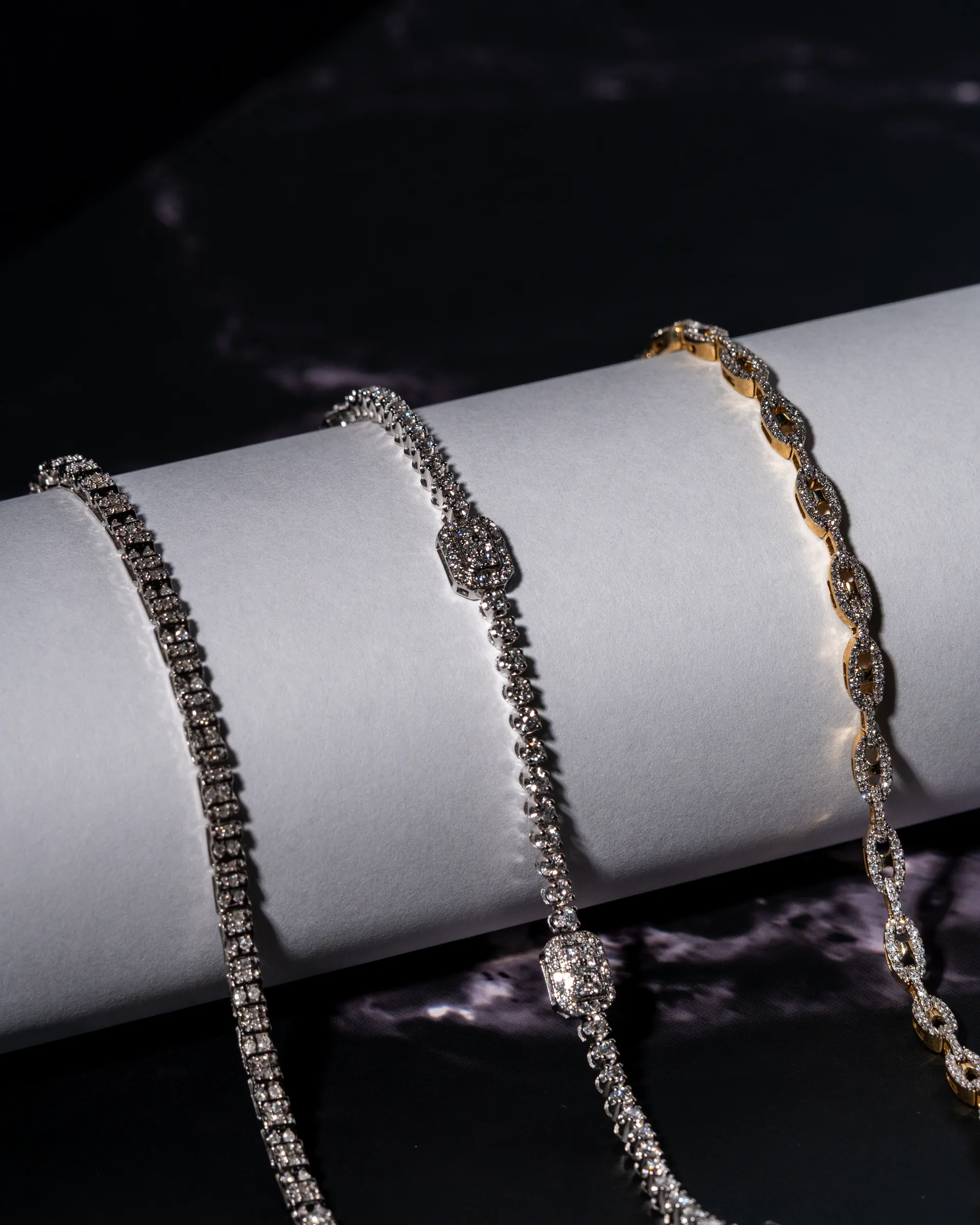 Tennis bracelets on a white display at NovaOro